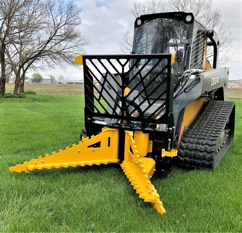 tree and post puller skid steer attachment|tractor mounted tree puller.